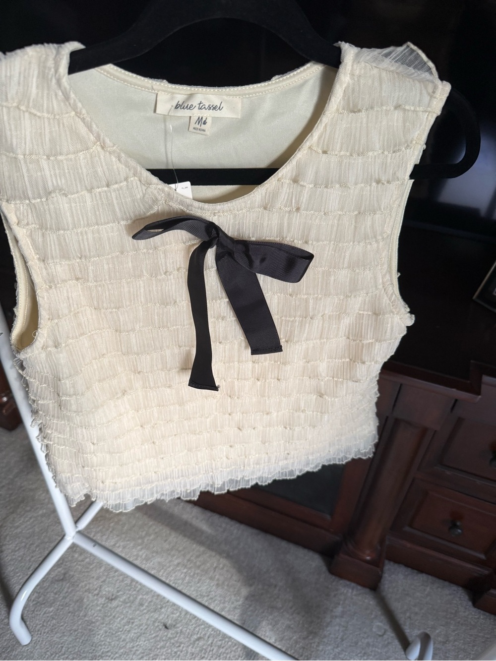 Blue Tassel Women's Cream Sleeveless Textured Top with Black Bow